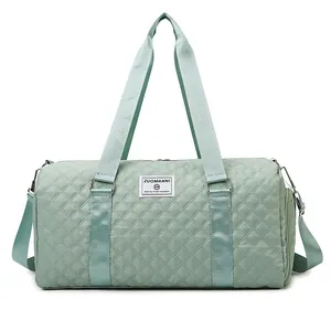 Large capacity mint green quilted travel duffel bag for sports and fitness gym training