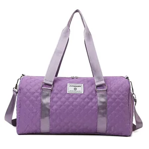 Large capacity purple quilted travel duffle bag for gym and sports