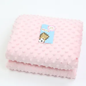 Soft pink double-layer minky dot baby blanket with Kolaco brand tag for newborns