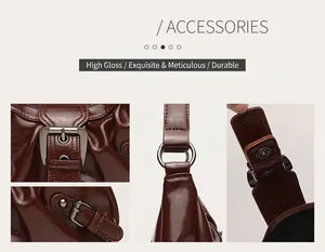 Detailed view of high-gloss metallic hardware on brown pleated shoulder bag