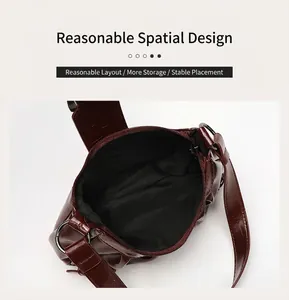 Detailed top view of a brown pleated cloud bag showing its large interior storage space