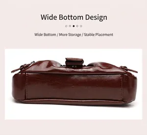 Detailed bottom view of retro pleated cloud underarm bag showing widened stable base