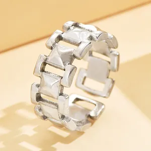 Minimalist silver chain link ring with geometric hollow design and adjustable open band