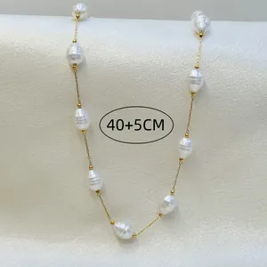 Close-up of elegant baroque pearl necklace on gold chain with 40+5cm length detail