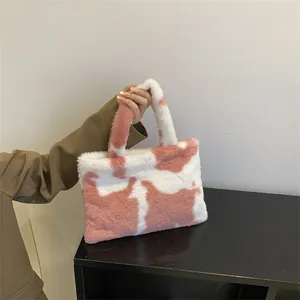Pink white cow print plush handbag with soft faux fur texture for women fashion