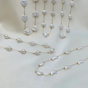 Elegant baroque pearl necklaces with heart, shell, and crescent moon charms in gold finish.