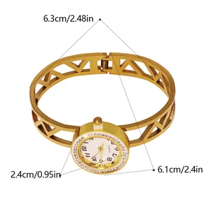 Elegant gold stainless steel bangle watch featuring a rotatable crystal-studded dial