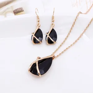 Fashion jewelry set featuring teardrop black gemstone necklace and earrings for women