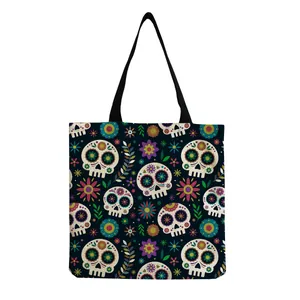 Detailed view of vibrant sugar skull pattern on a large capacity canvas tote bag