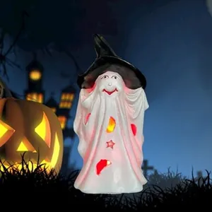 Halloween ghost figurine with witch hat and glowing cutout stars for spooky home decor