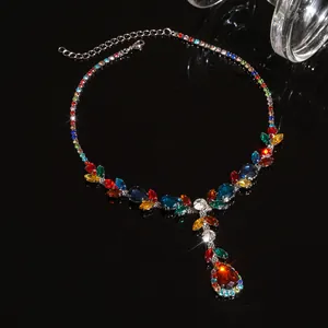 Vintage colorful leaf and teardrop rhinestone necklace for women on black background