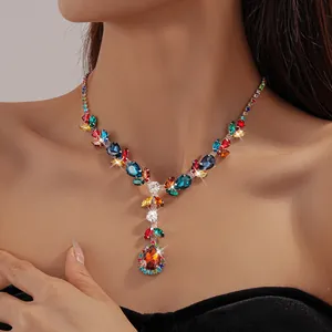 Close-up of retro court style necklace with colorful zircon leaves and waterdrop pendant