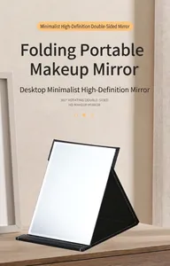Portable folding desktop makeup mirror with premium black leather stand and adjustable angle.