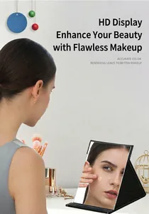 Detailed view of a portable folding makeup mirror with a premium black leather cover