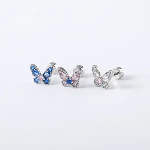 Detailed view of dainty butterfly stud earrings with colorful zircons and screw backs.