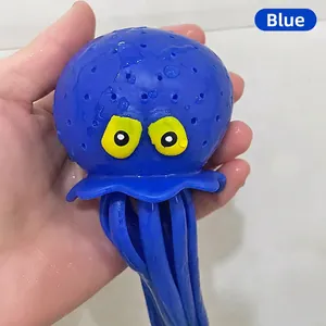Close-up of blue octopus squeeze toy with water spray function for bath time fun