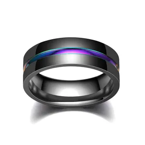 Close-up of black titanium steel ring with vibrant rainbow color groove design