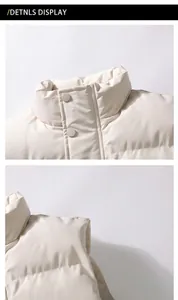 Close-up view of a beige men's padded winter vest showing collar and button details
