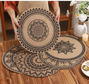 Detailed view of Bohemian round polyester-linen placemats on a rustic wooden table.