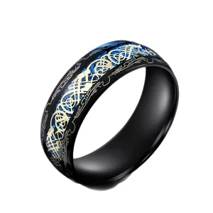 Black titanium steel ring with gold dragon pattern and blue sparkly inlay