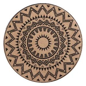 Round bohemian printed placemat with geometric tribal patterns on jute-like fabric