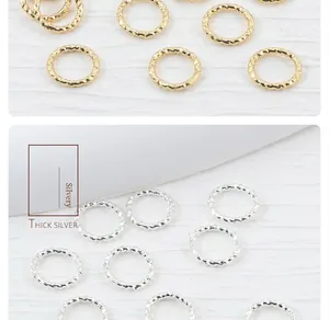 Detailed close-up showing twisted silver connector rings for DIY jewelry making.