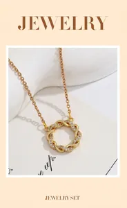 Close-up of gold-plated copper Mobius ring necklace encrusted with cubic zirconia