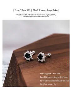 S999 sterling silver snowflake stud earrings with black cubic zirconia detail