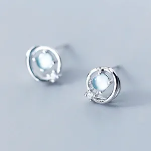 High-quality detailed view of S925 silver crescent moon earrings with light blue stone