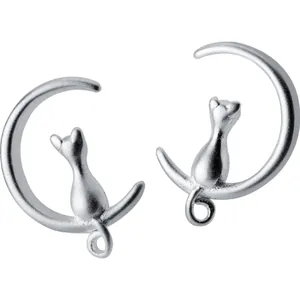 S925 silver stud earrings featuring a cat sitting on a crescent moon, matte finish
