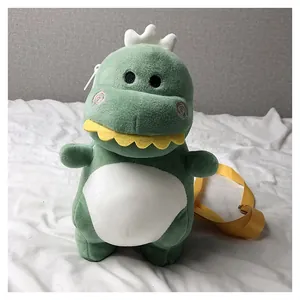 Adorable green dinosaur plush crossbody bag with a soft texture and adjustable yellow strap