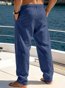 Back view detail of blue breathable loose-fit straight-leg summer pants for men