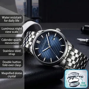 Detail of quartz watch with blue sunray dial, calendar window and stainless steel band