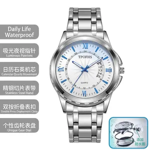 Detail of silver stainless steel quartz watch with white dial and blue Roman numerals.
