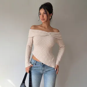 Elegant beige off-the-shoulder long sleeve knit top with an asymmetrical hemline.