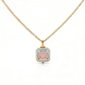 Elegant golden Mother's Day locket necklace with pink heart and MOM engraving details.