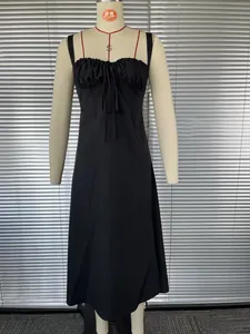 Detailed view of a black French-style camisole dress with corset-style bodice details