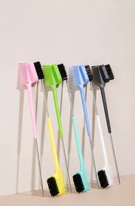 Detail of multi-colored double-headed eyebrow and eyelash brushes for makeup styling