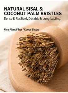 Macro view of dense natural sisal and coconut palm fibers on a wooden cleaning brush.