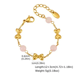 Detailed size specifications for children's gold stainless steel bow-tie bracelet with pink beads.