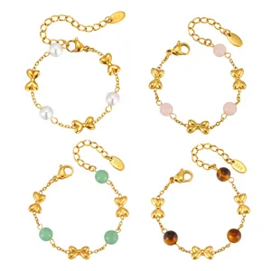 Gold-plated stainless steel bracelets with bow charms and colorful beads for kids.