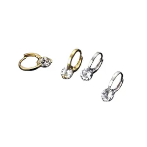 Elegant minimalist hoop earrings with brilliant round cubic zirconia in gold and silver finish