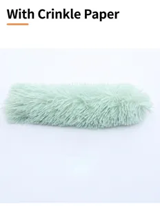 Close-up of shaggy mint green plush cat toy featuring internal rustling crinkle paper
