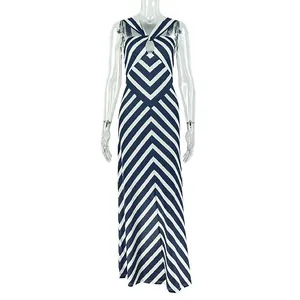 Elegant navy and white striped V-neck maxi dress with hollow-out detail
