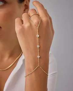 Elegant 16k gold-plated finger bracelet with minimalist hand chain and round stones