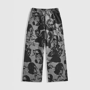 Close-up of grey high-street wide-leg cargo pants with artistic portrait print