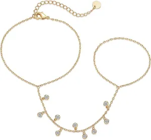 Detailed view of elegant 16k gold plated finger bracelet with dangling clear crystal charms