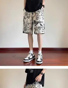 Detail view of men's casual ink floral shorts with loose fit and quick-dry fabric design