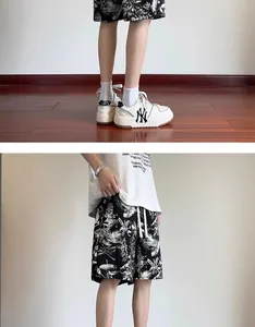 Detail of men's quick-dry casual shorts featuring black and white ink pattern
