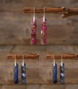 Detailed view of bohemian rectangular natural stone earrings in pink and blue marble